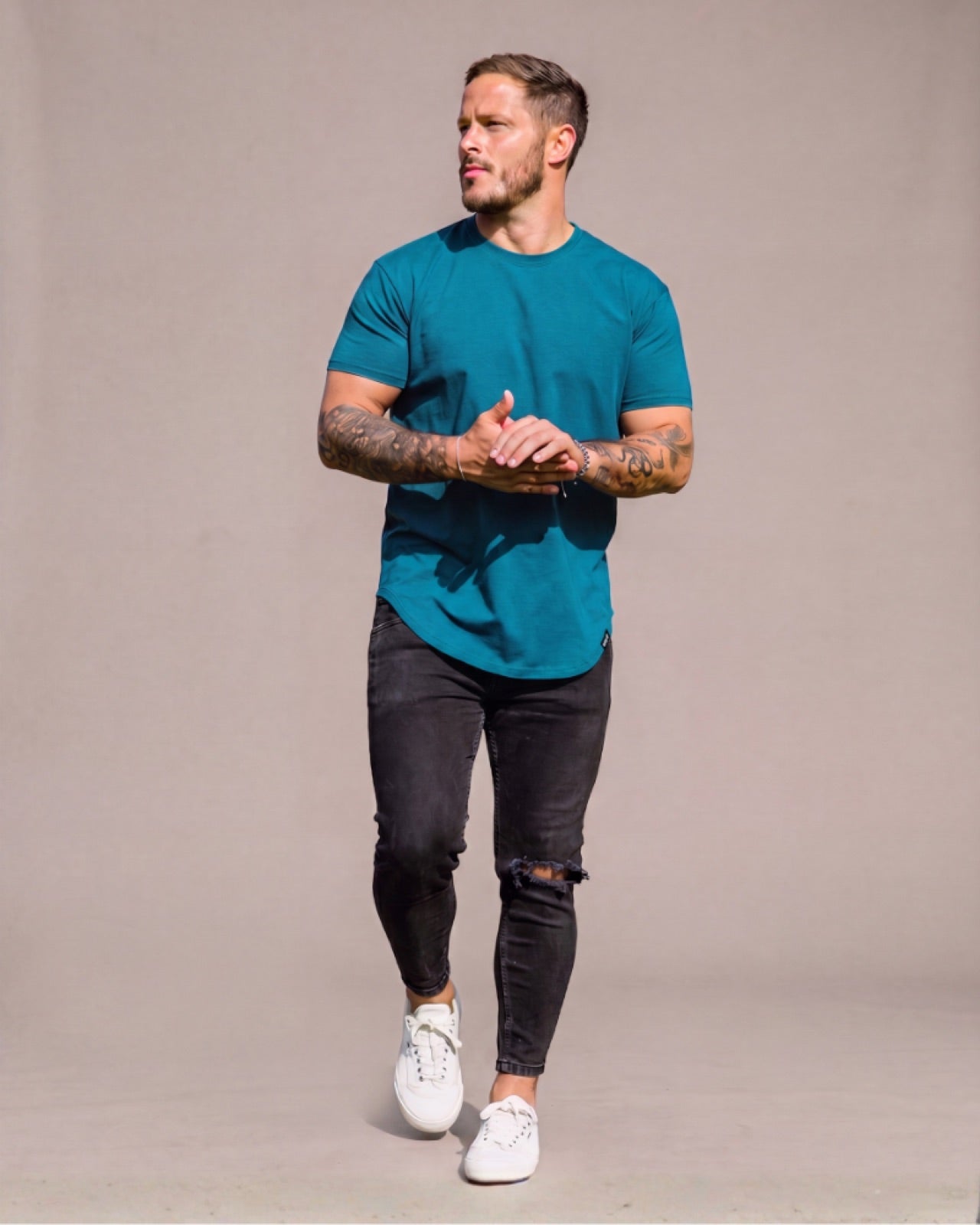 021 Originals drop-cut tee worn outdoors